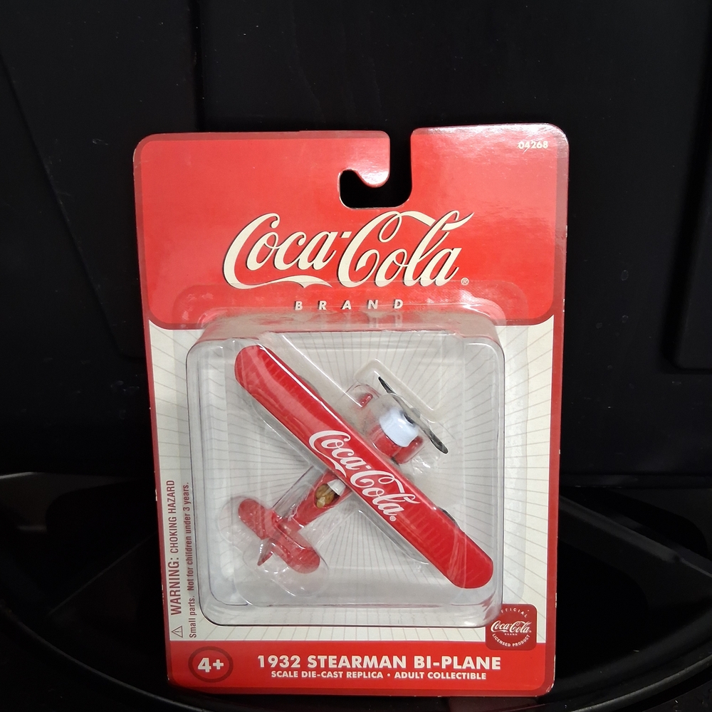 Coca-Cola Collectible Packaging with Black and White Design